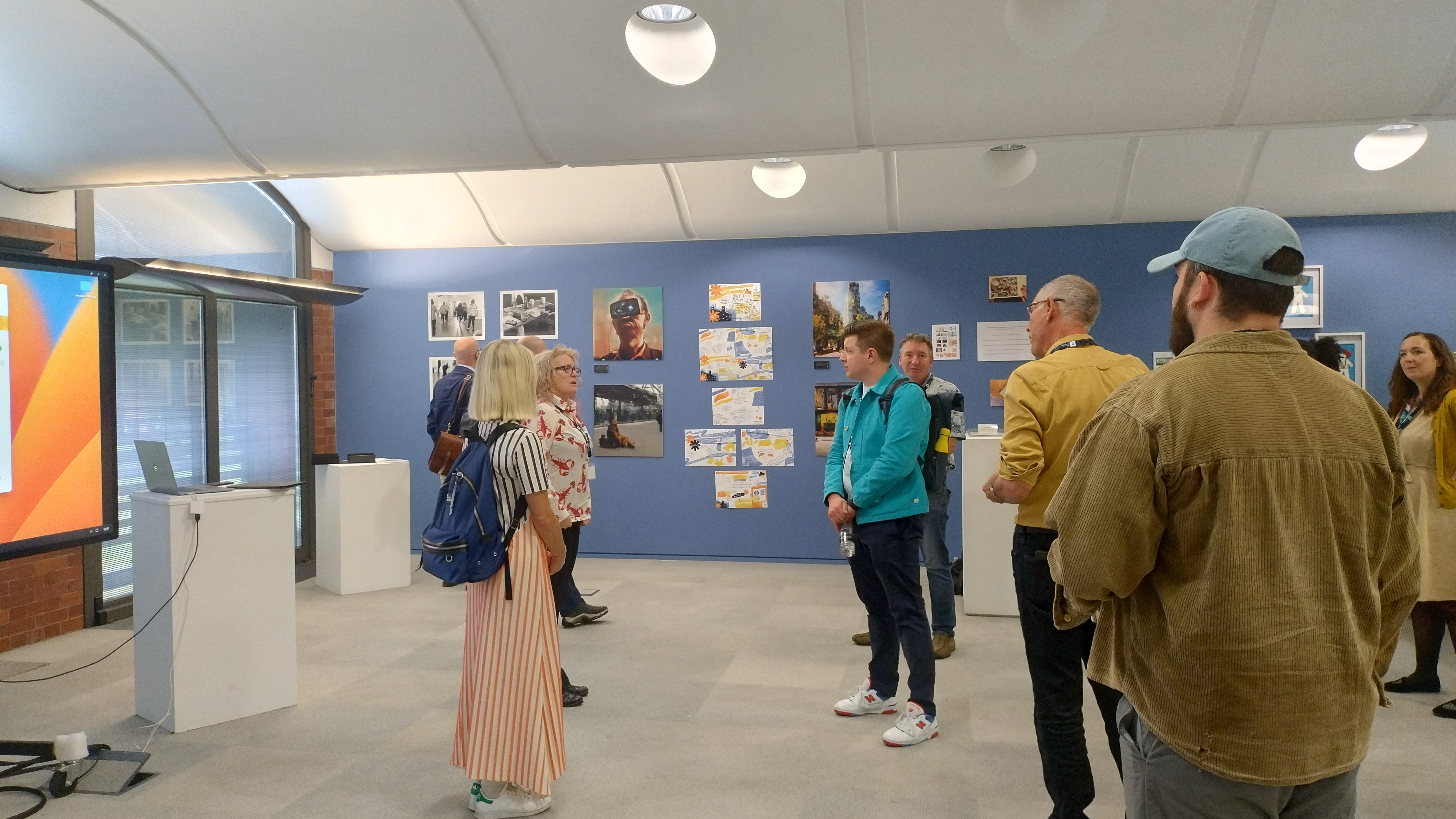 Group of People viewing the telling stories projects