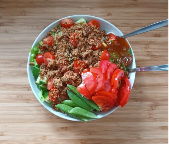 A picture of a bowl with food in it