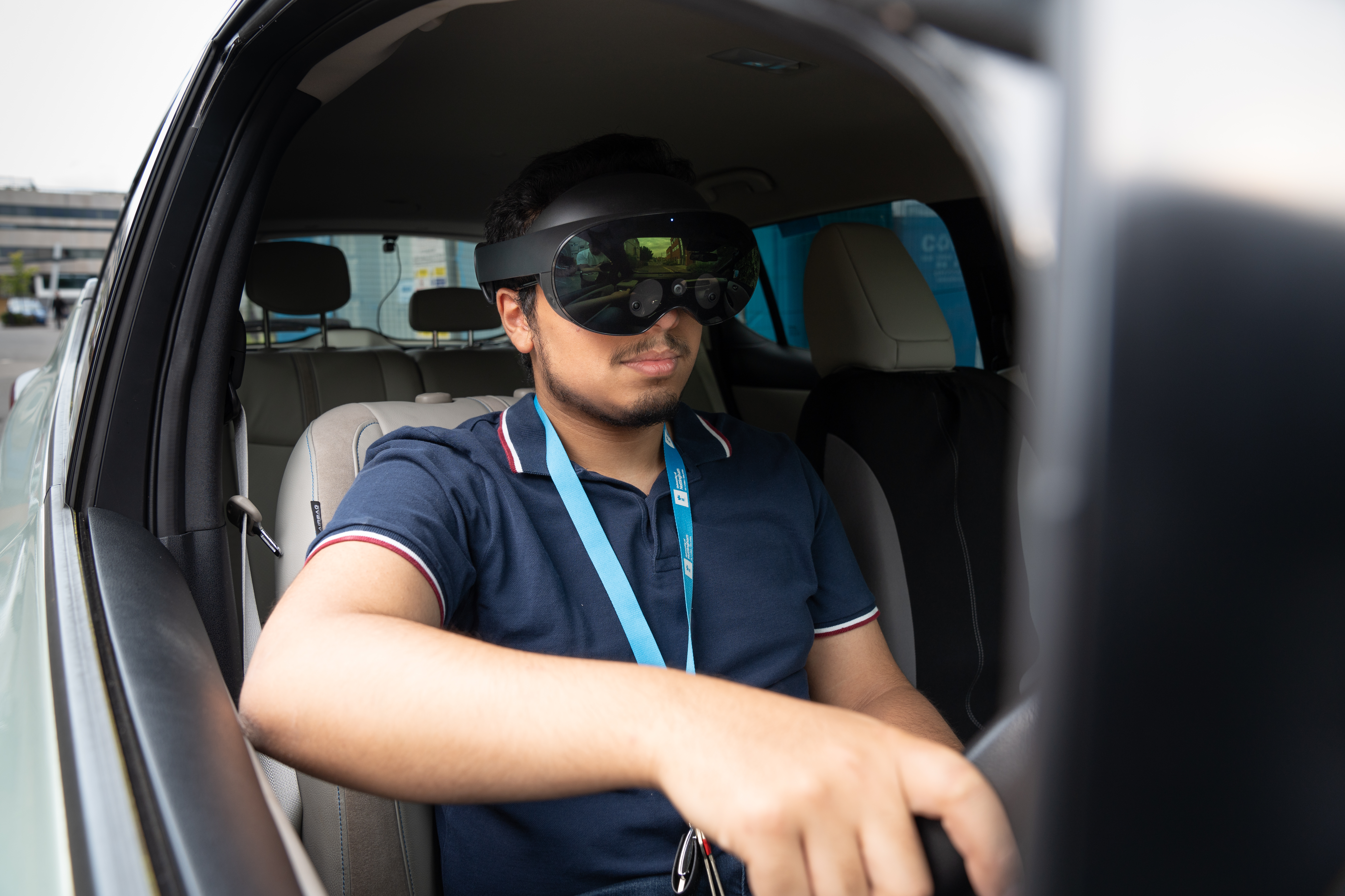 Postgraduate student in VR headset, in ServCity Driverless Car, Innovative Technology Research Centre, University Park campus