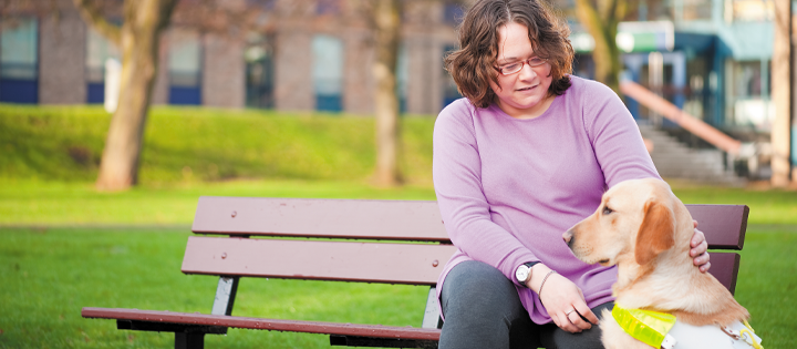 University disability advisor with dog Tilly