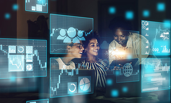 three females with a technology background showing different screens