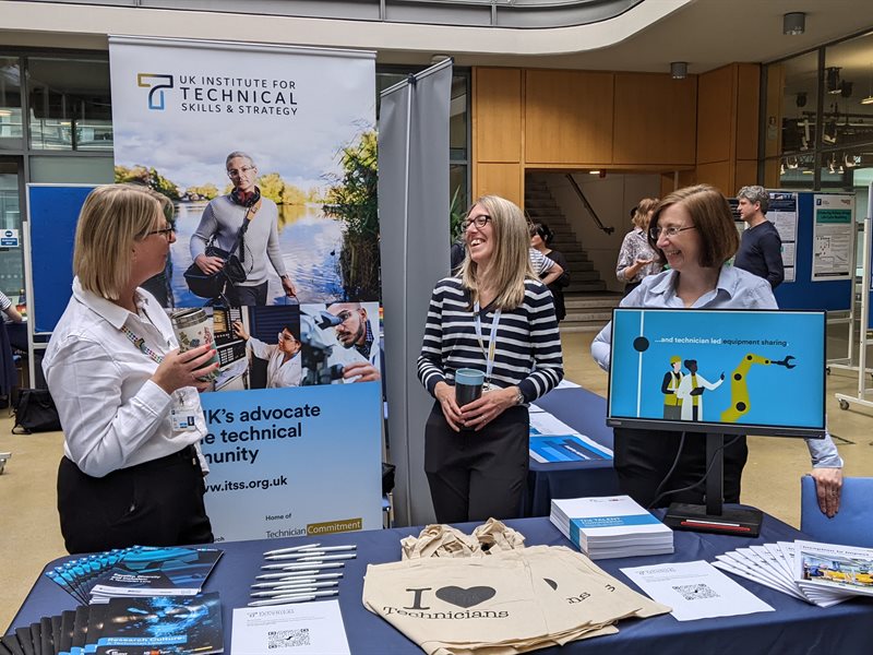 Staff members at the stand for the Institute for Technical Skills and Strategy