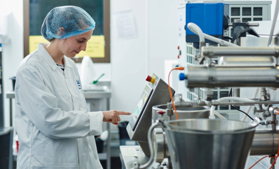 Scientist operating an equipment in the food hall