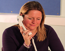 How do I use the telephone with my hearing aids?