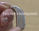 What should I do if my hearing aids are buzzing?