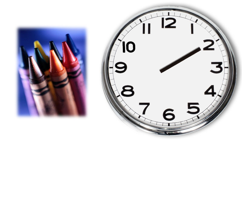 Face of a clock and crayons