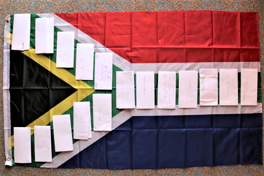 The South African flag with letters placed on top.