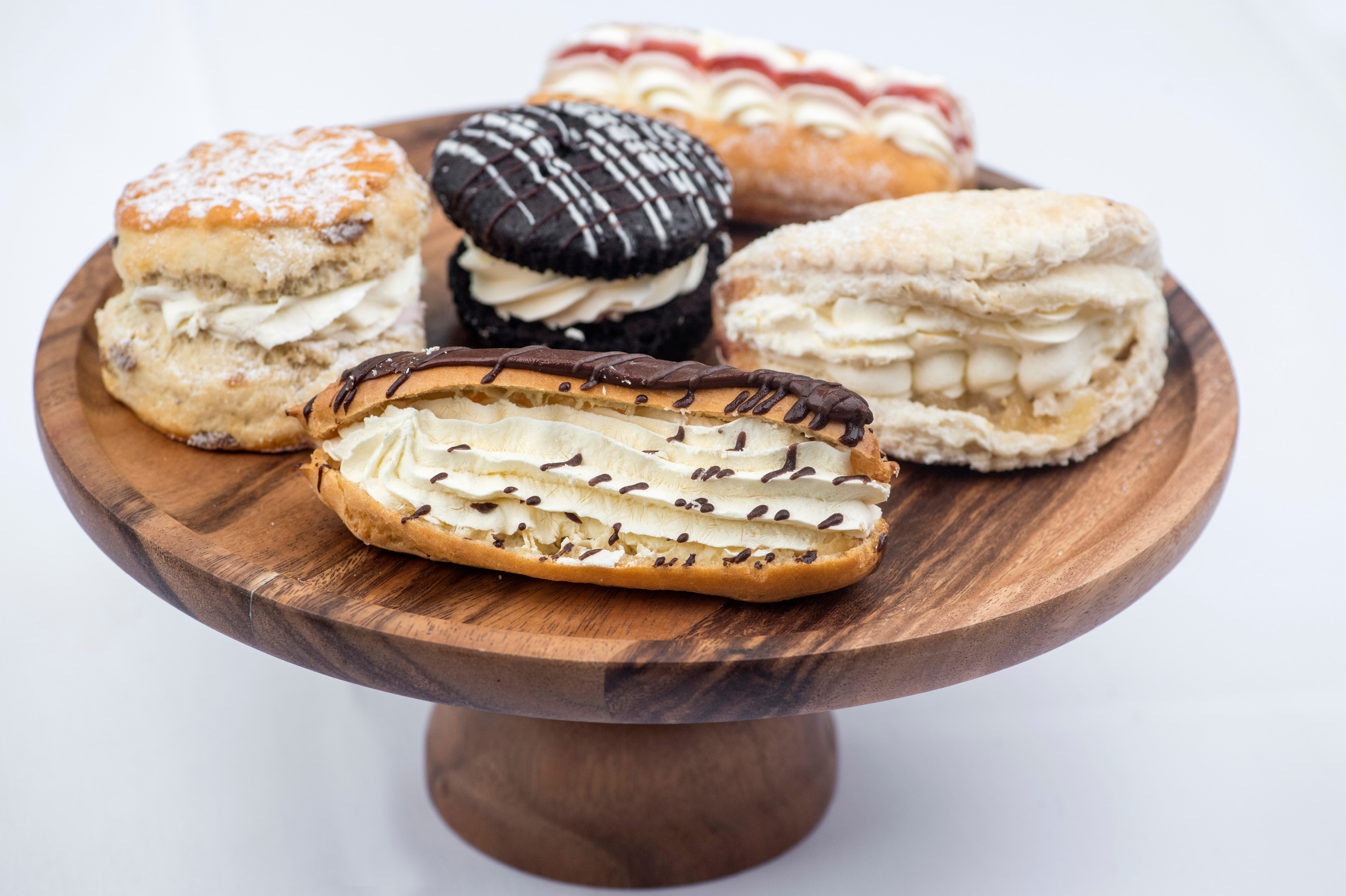 Image of cakes on a wooden plate