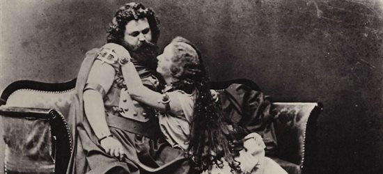 Old black and white photograph showing two actors from Tristan and Isolde opera