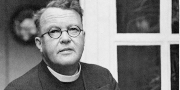 Black and white head and shoulders portrait of Reverend John Firth