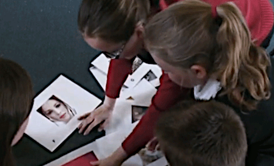 Philosophy student working with school pupils