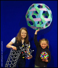 Photo of kids with molecular models