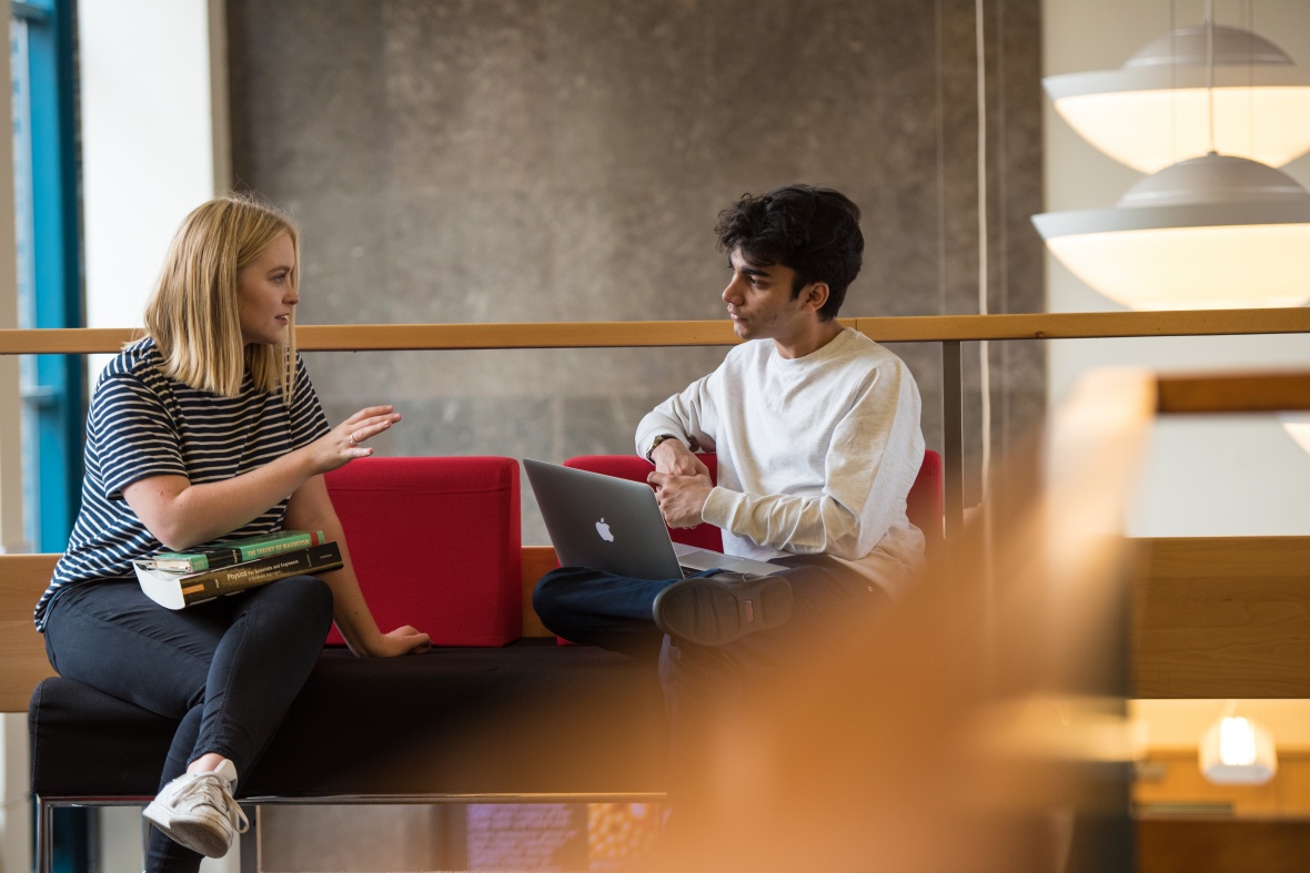 Physics students chatting