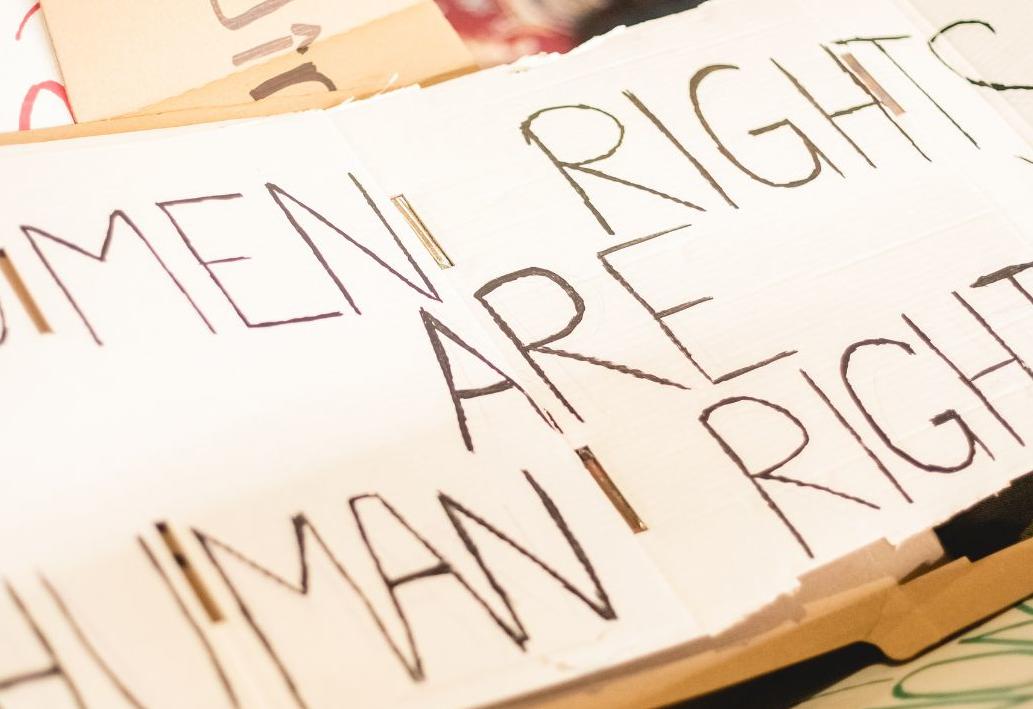 A cardboard with the text - Women's rights are human rights