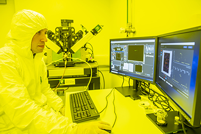 Researcher using the Beacon Imaging Ellipsometer