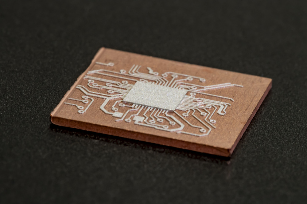 An electronic circuit featuring micro resolution printed in Sn on a Cu substrate using the MetalJet platform at the Centre for Additive Manufacturing at University of Nottingham