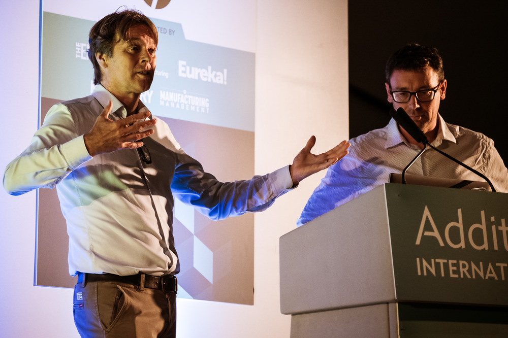 Prof Richard Hague and Prof Chris Tuck speaking at a conference in additive manufacturing