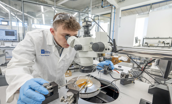 STEM Researcher from the Centre for Additive Manufacturing using 4 terminal micropositioners to measure conductivity of a 3D inkjet printed optoelectronic structure