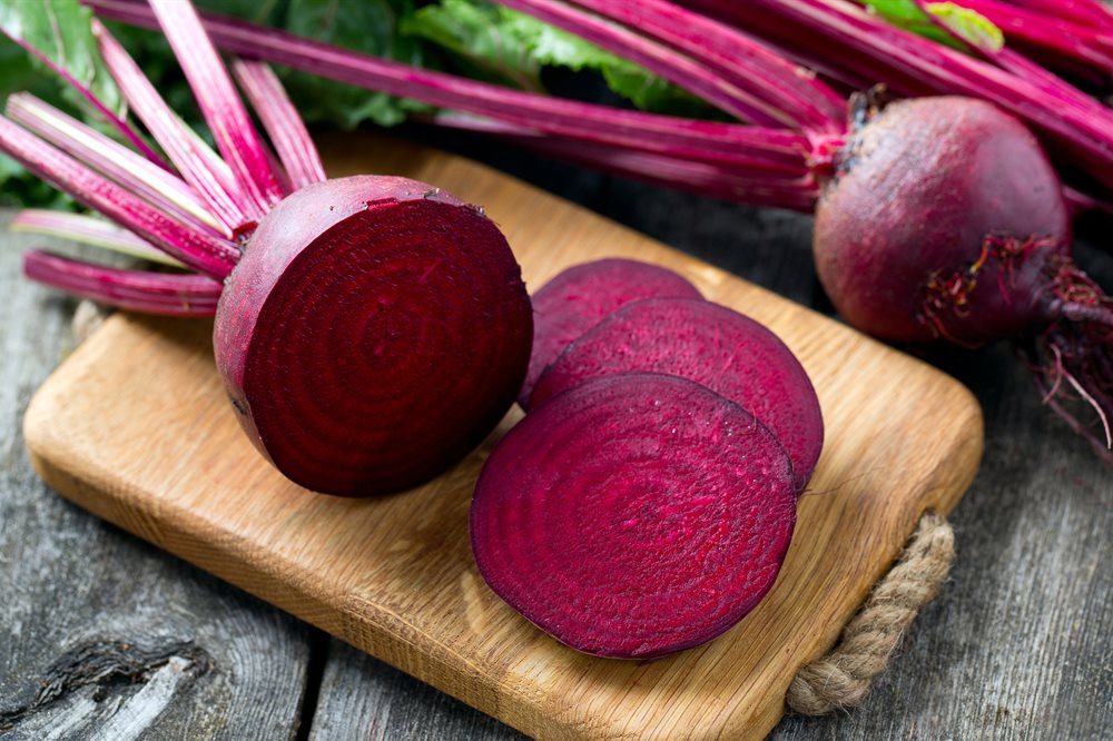 Beetroots on chopping board