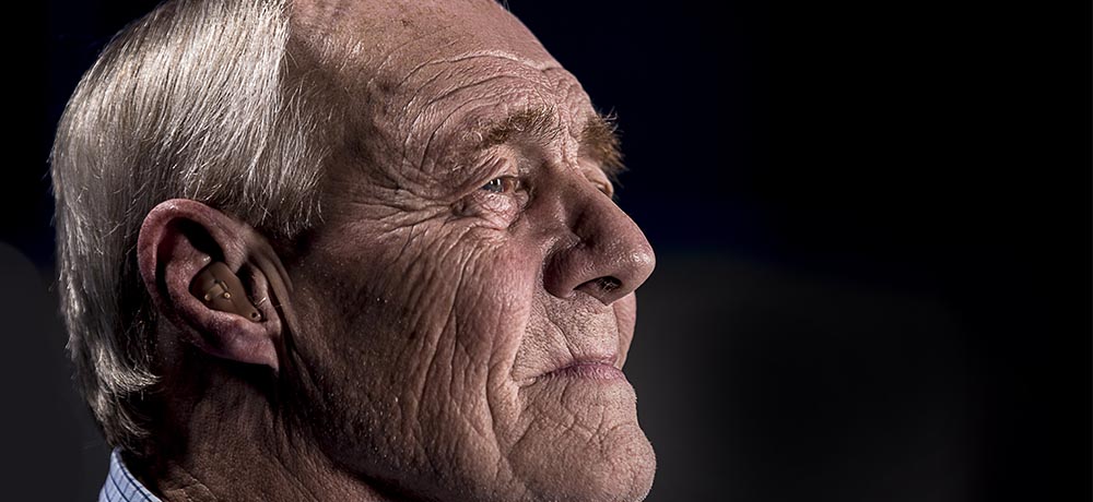 Close up of the side of an elderly man's face