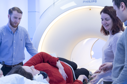Students with MRI machine