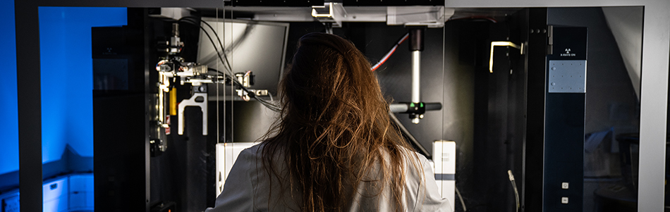 Researcher using machinery in the Biodiscovery Institute