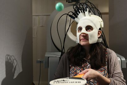 Photograph of female subject wearing the developed brain scanner