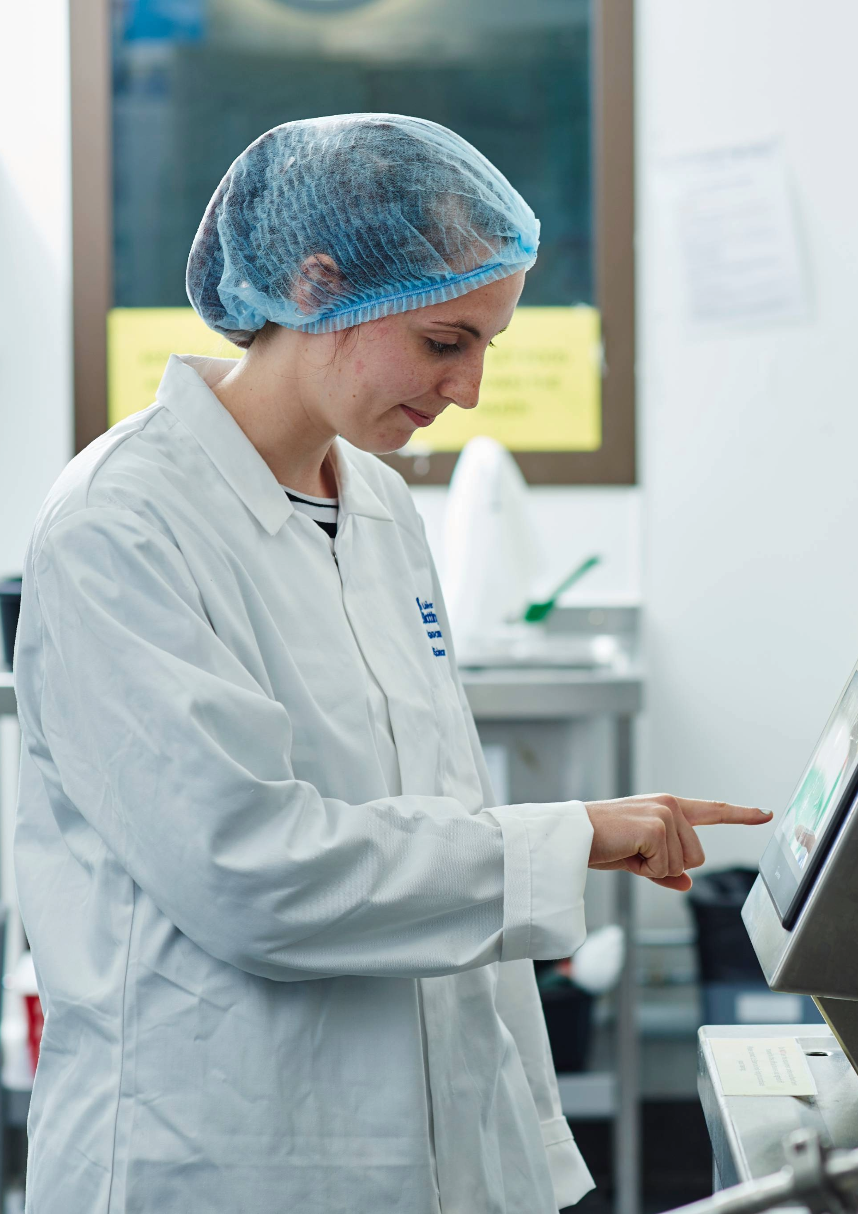 Researcher operating an equipment in the lab