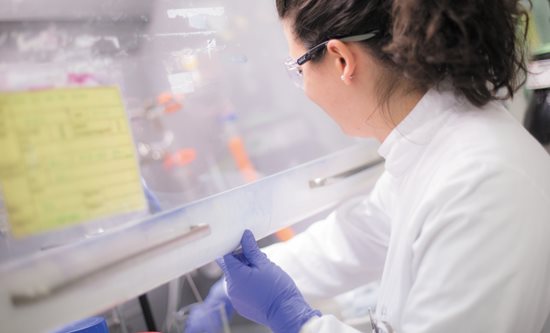 A pharmacy student conducts research