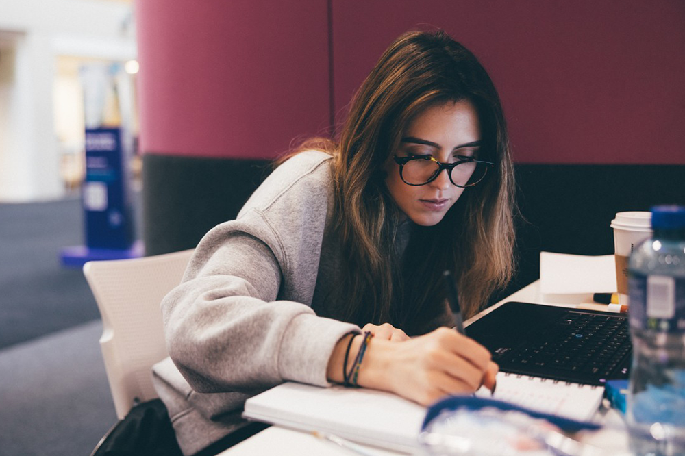 Student working in George Green Library