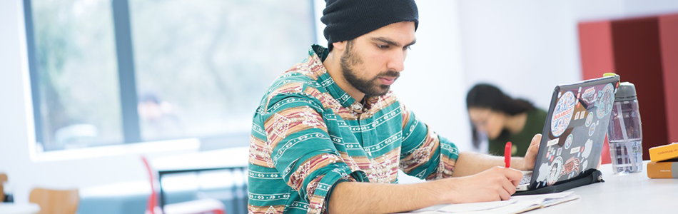 Student working on a laptop