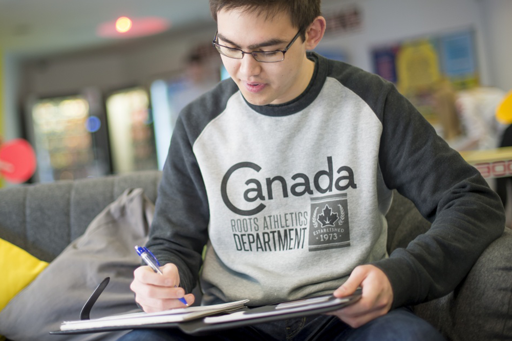 Student taking notes