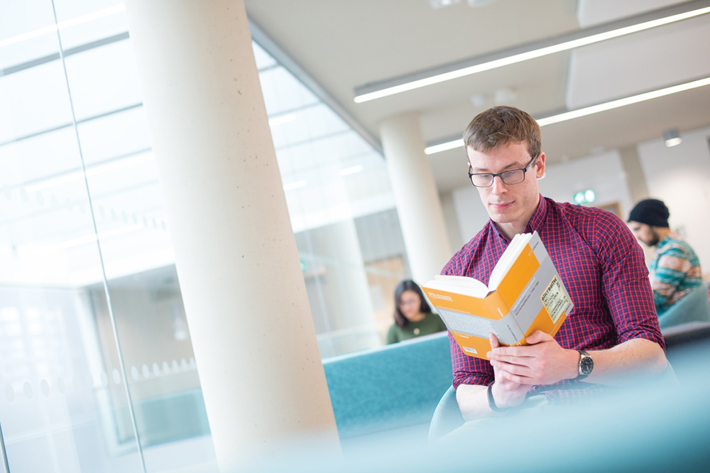 Student reading a book