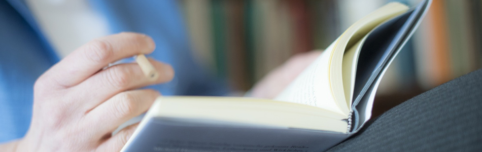 Book resting on a lap