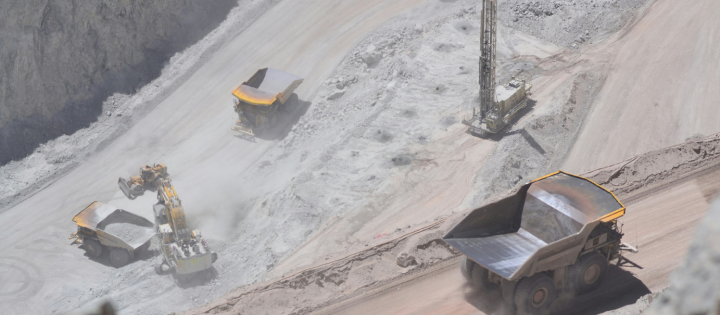 Photograph of trucks at construction site