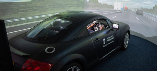 Photo of person in a virtual driving lab.